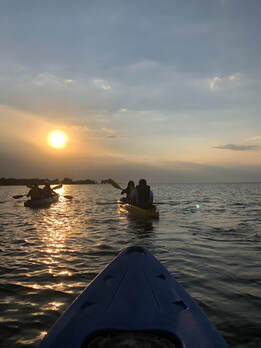 Sunset on Egg Harbor with kayaks